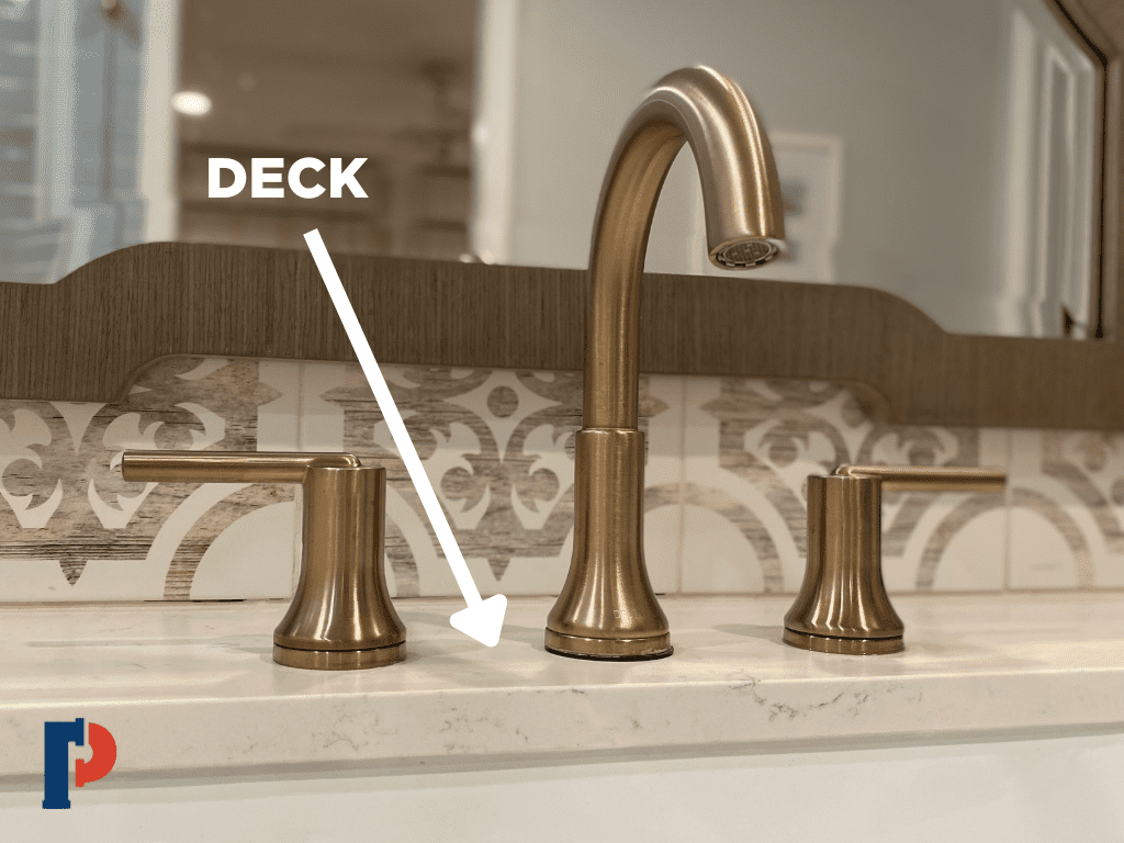 Deck mount faucet with arrow pointing to the deck