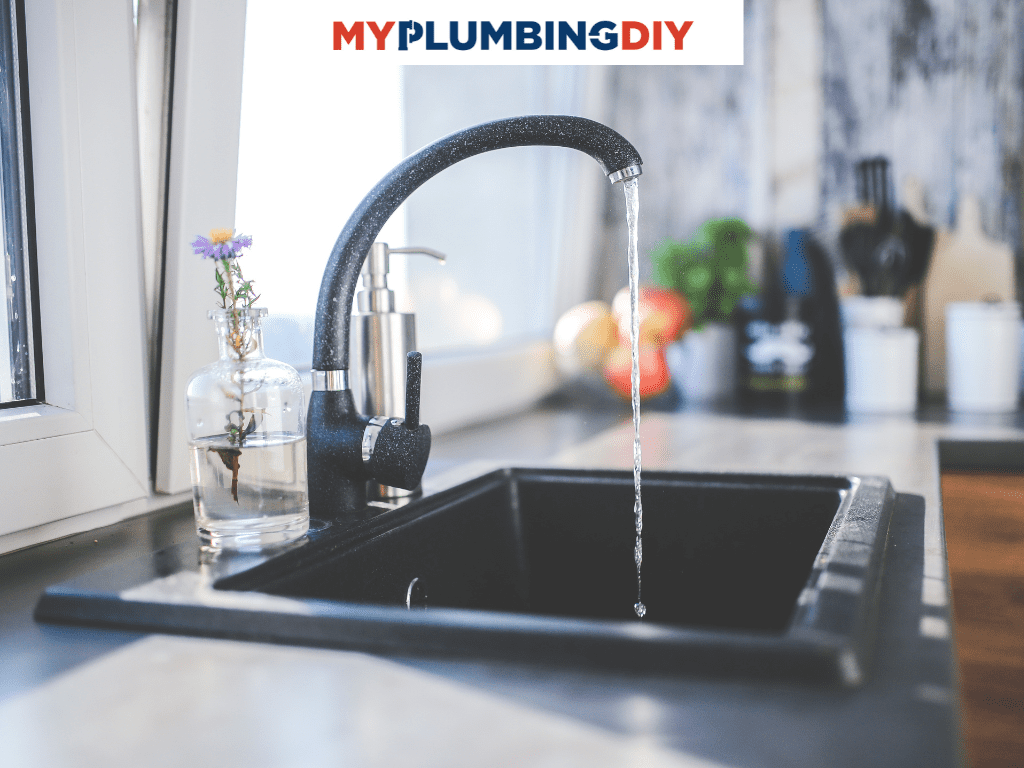 black drop in sink in kitchen